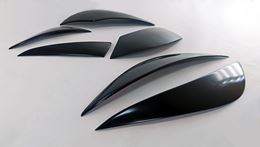 Тюнинг комплект накладок на передние фары и задние фонари для Opel Astra J 2009-2012