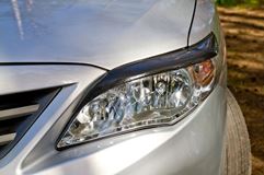 Накладки на передние фары (реснички) Toyota Corolla (седан) 2010-2013
