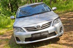 Накладки на передние фары (реснички) Toyota Corolla (седан) 2010-2013