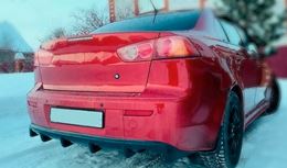 Накладка на задний бампер диффузор шагрень ПОД ОДНУ ТРУБУ Mitsubishi Lancer 10