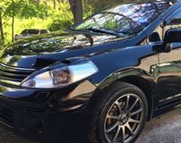 Накладки на передние фары (реснички) для Nissan Tiida (хэтчбек) 2004-2014