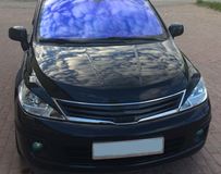 Накладки на передние фары (реснички) для Nissan Tiida (хэтчбек) 2004-2014