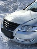 Решётка радиатора с черной сеткой Nissan Almera Classic 2007-2012 ШАГРЕНЬ